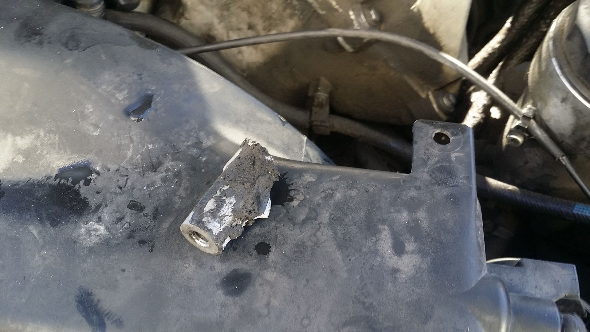 Did I just total my car? Serpentine Belt Tensioner Mount Broke off.